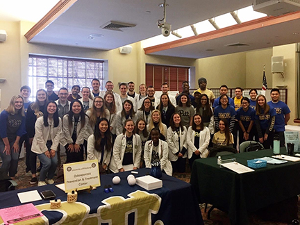 Large Group of Students;PittPharmacy’s ASCP chapter at Community center